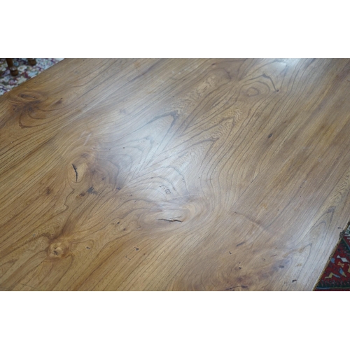 1209 - A Victorian style rectangular elm farmhouse table, length 272cm, depth 87cm, height 78cm