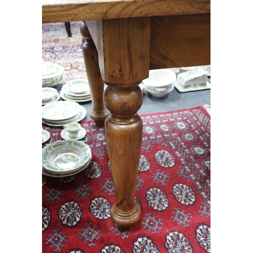 1209 - A Victorian style rectangular elm farmhouse table, length 272cm, depth 87cm, height 78cm