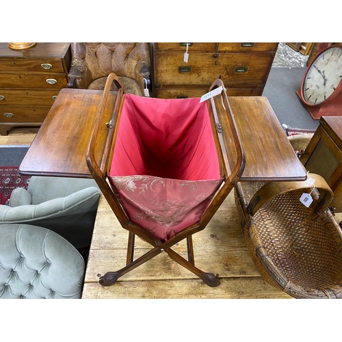 1211 - An early 20th century mahogany sewing basket, width 62cm, depth 35cm, height 61cm