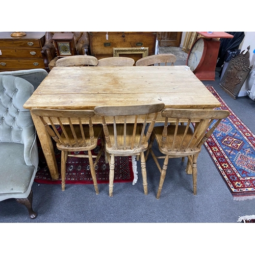 1212 - A Victorian rectangular pine kitchen table, length 136cm, depth 81cm, height 77cm together with six ... 
