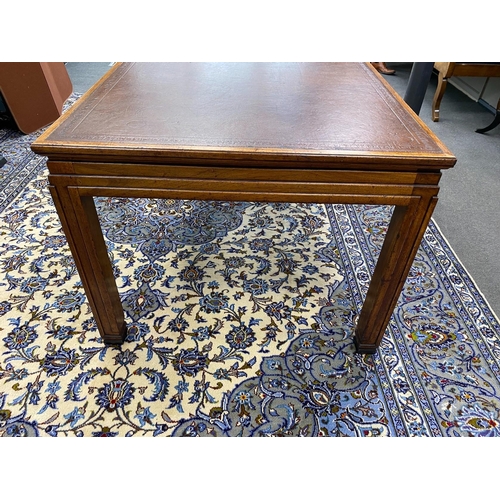 1223 - An Art Deco rectangular mahogany library table with leather inset top, bears Howard & Son retail pla... 