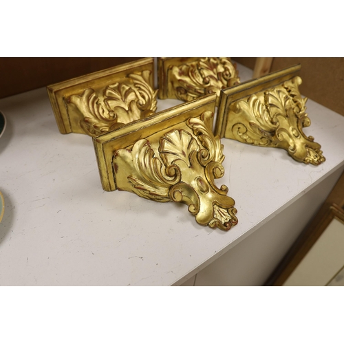 1271 - A set of four gilt wood wall brackets, 18.5cm tall x 24cm wide