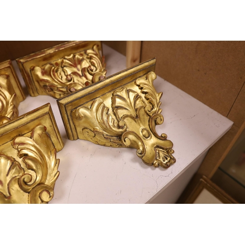 1271 - A set of four gilt wood wall brackets, 18.5cm tall x 24cm wide