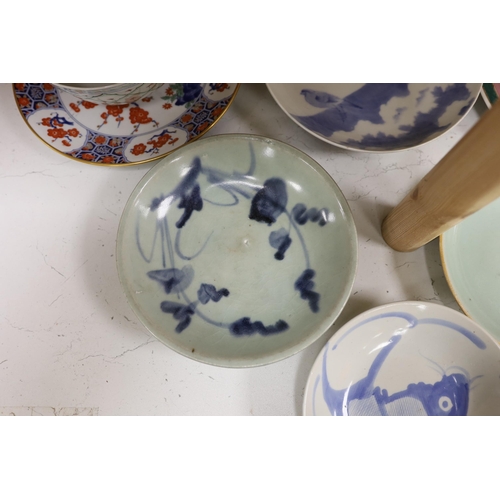 1272 - A group of Chinese plates and dishes including a Ming dynasty blue and white bowl