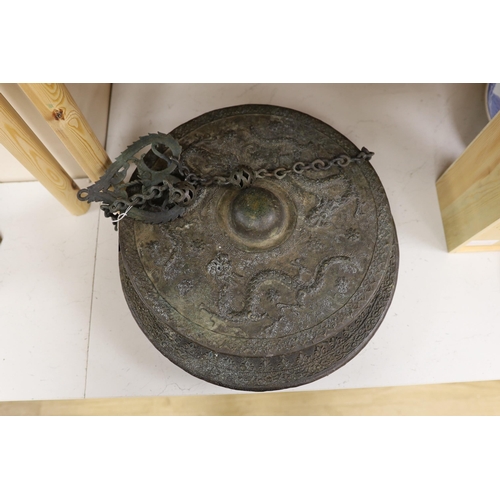 1277 - Two 19th century Borneo bronze gongs, Tawak-Tawak, largest 42cm diameter