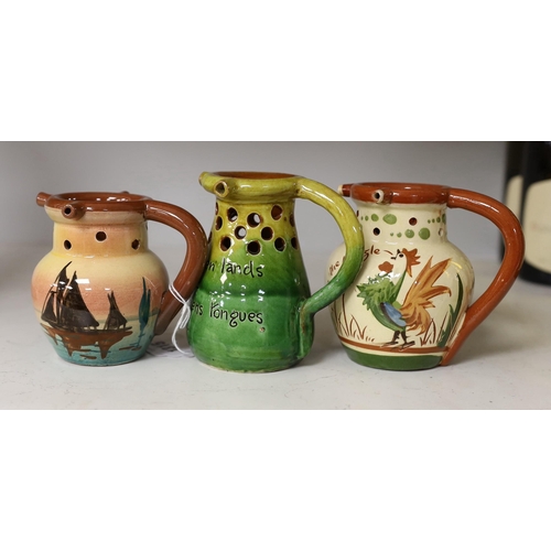 1315 - Three West Country mottoware puzzle jugs. Tallest 12cm