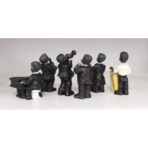 1324 - A moulded composition six-piece jazz band, 10cm tall