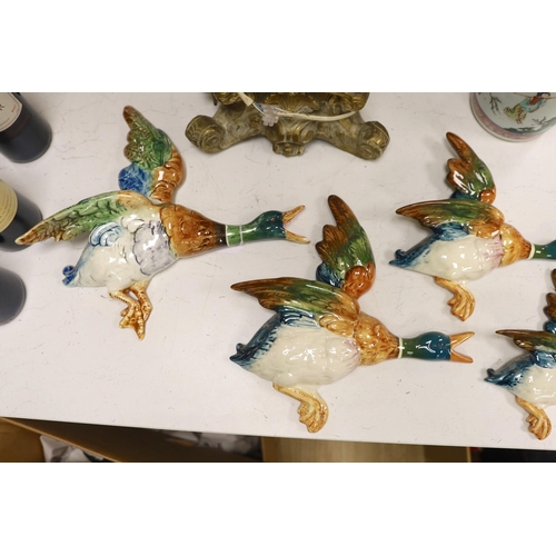 1350 - A set of five graduated Beswick porcelain flying ducks and two others by Royal Dux and Shorter.... 