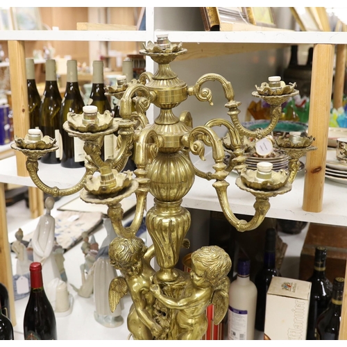 1352 - A pair of heavy brass candelabra, 85cm total height