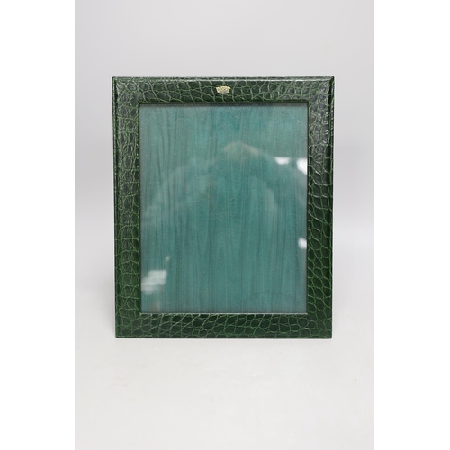 1370 - An Asprey green faux crocodile hide desk set, comprising photograph frame, 32 cm high and Moser glas... 