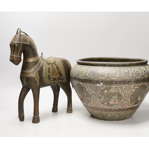 1375 - An Indian engraved brass jardiniere and brass-mounted wood horse, 31cm tall