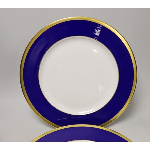 1388 - Six Asprey, London, blue and gilt banded dinner plates, 34cms diameter