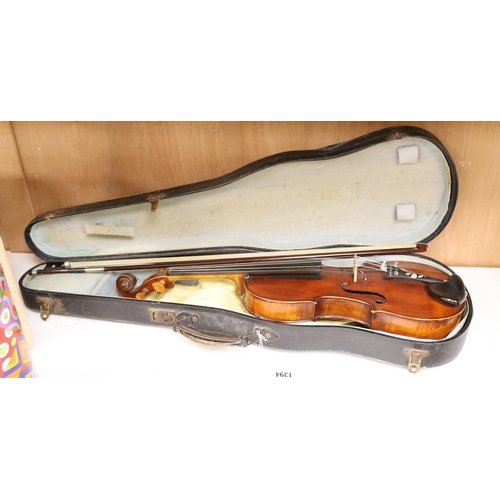 1394 - A French single back violin, interior label reads Médio Fino, back measures 35.5cm excl button. Wi... 