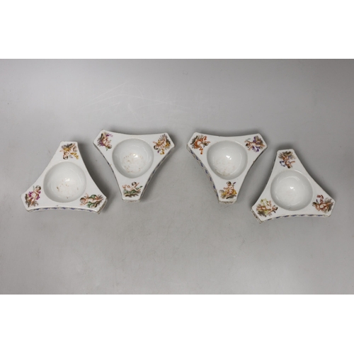 1401 - A set of four Dresden triangular cherub salts, Helena Wolfsohn atelier, 8cms wide