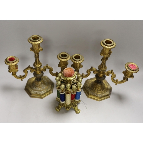 1402 - A pair of two branch three light gilt bronze candelabra and a brass cotton reel holder, candelabra 2... 