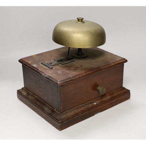 1410 - A large mahogany cased block bell, 24cms high