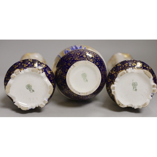 1414 - A pair of Royal Doulton vases and another (3), pair 29cms high