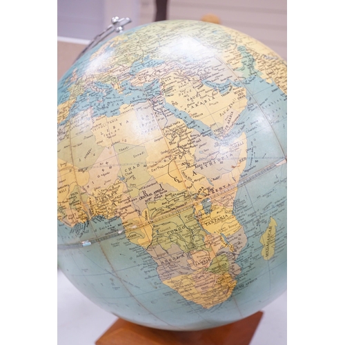 1421 - A Philips Challenge Globe on stand, scale 1:37,500,000, diameter 13.5 inches