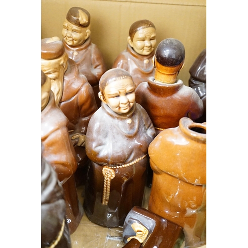 1423 - A group of twenty three Doulton style figural spirit flasks and a jug