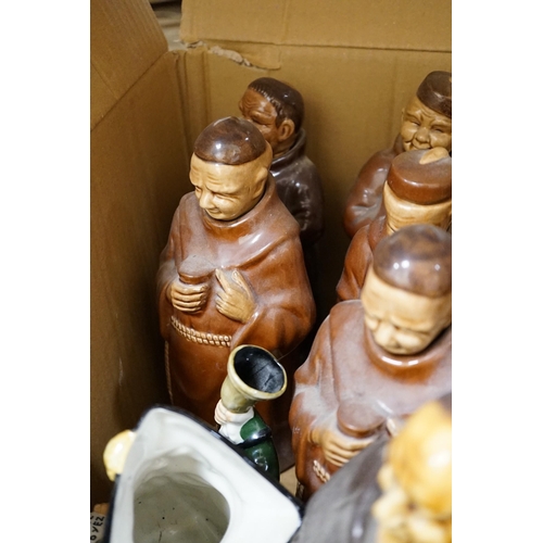 1423 - A group of twenty three Doulton style figural spirit flasks and a jug