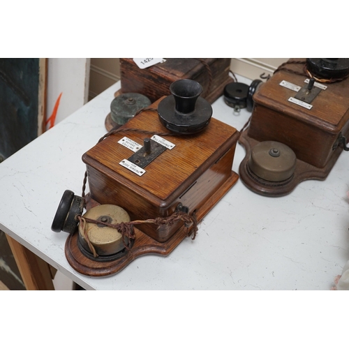 1425 - Three Ericsson oak cased railway signal box telephones, largest 30cms long