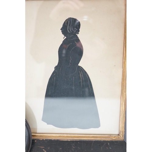 1440 - An oval silhouette dated on reverse 1777 together with a larger later silhouette-25cms high x 19cms ... 