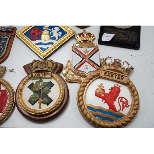 1444 - A collection of approximately twenty five plaster and other naval / military and Royal wall hanging ... 