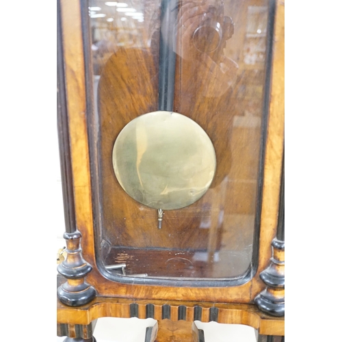 1449 - A walnut and ebony cased Vienna wall clock, 130cms high