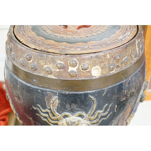 1451 - A Chinese lacquer decorated wood barrel form seat/storage container, 40cms high