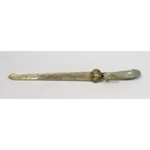 1504 - A Chinese celadon jade belt hook handled paperknife, the 19th century belt hook 8.2 cm long, total l... 