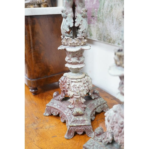 1533 - A pair French cast metal candlesticks. 47cm tall