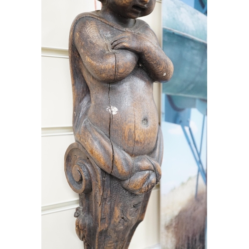 1536 - A carved figural wall mount. 64cm tall