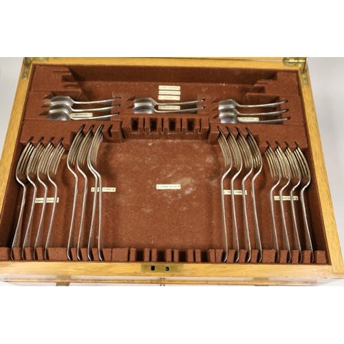 1801 - A matched part canteen of George V silver Hanovarian pattern flatware, comprising fifty four items, ... 