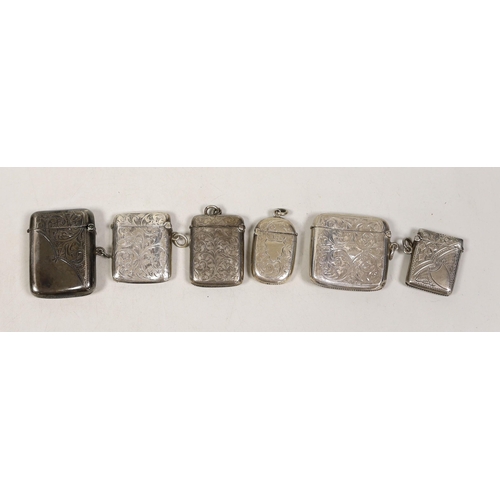 1831 - Six assorted mainly early 20th century engraved silver vesta cases, largest 56mm.