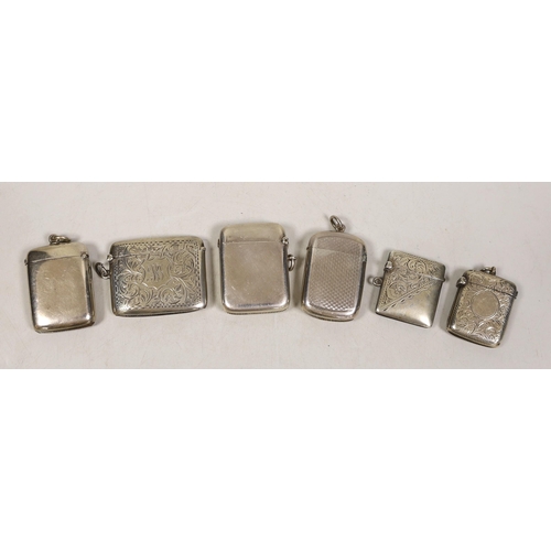 1832 - Six assorted mainly early 20th century engraved or engine turned silver vesta cases, largest 52mm.... 