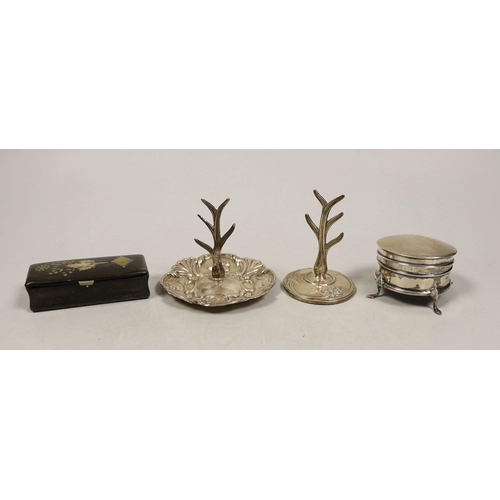 1841 - Two early 20th century silver ring stands, tallest 7cm, a small silver mounted trinket box and a 19t... 