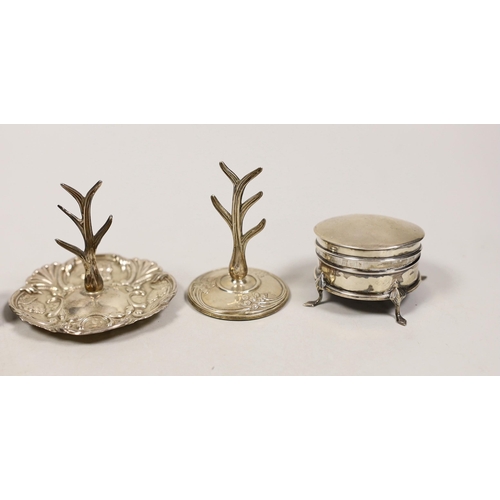 1841 - Two early 20th century silver ring stands, tallest 7cm, a small silver mounted trinket box and a 19t... 