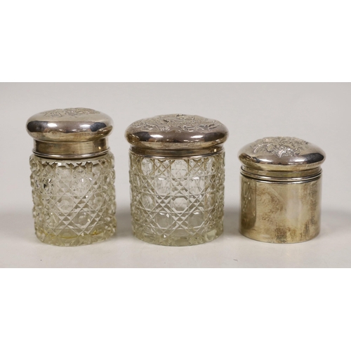 1842 - Two early 20th century silver mounted glass Reynolds angel lid toilet jars, tallest 89mm and one oth... 