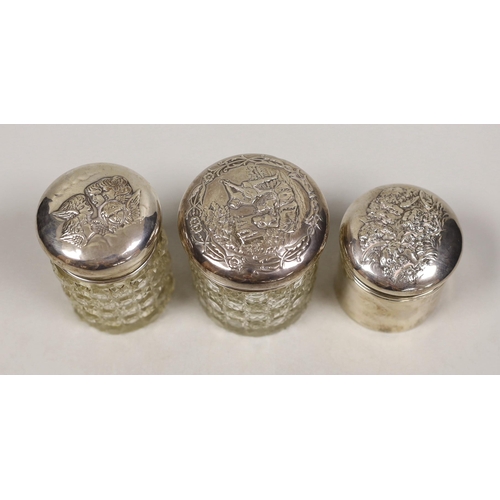 1842 - Two early 20th century silver mounted glass Reynolds angel lid toilet jars, tallest 89mm and one oth... 