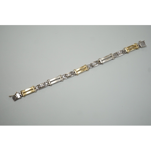 1875 - A modern two colour 585 and twelve stone diamond set bracelet, 17.75cm, gross weight 19.2 grams.... 