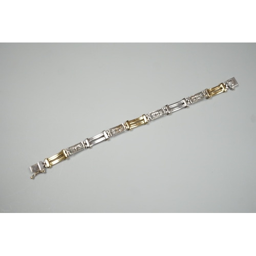 1875 - A modern two colour 585 and twelve stone diamond set bracelet, 17.75cm, gross weight 19.2 grams.... 