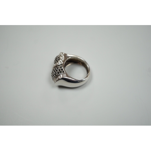 1877 - A modern 750 white metal and pave set two colour diamond dress ring, size K/L, gross weight 15.4 gra... 