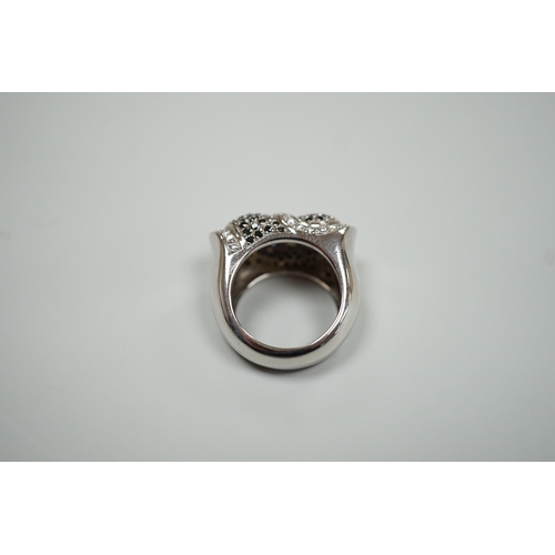 1877 - A modern 750 white metal and pave set two colour diamond dress ring, size K/L, gross weight 15.4 gra... 