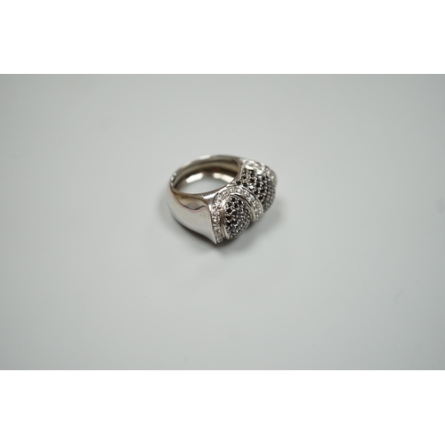 1877 - A modern 750 white metal and pave set two colour diamond dress ring, size K/L, gross weight 15.4 gra... 