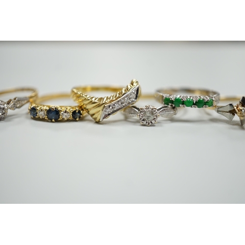 1878 - Six assorted mainly modern 18ct and gem set rings, including single stone diamond and George V sapph... 