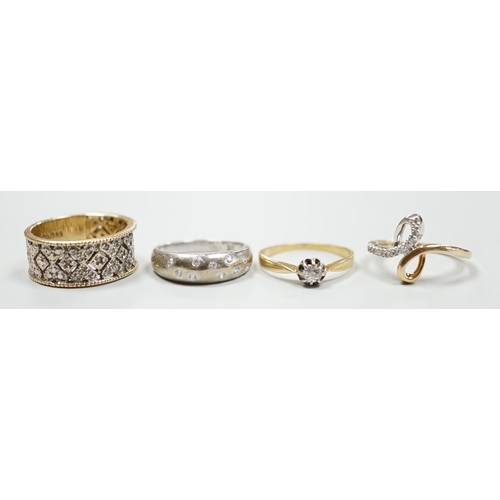 1879 - Three modern 9ct gold and diamond chip set rings and a yellow metal and solitaire diamond set ring, ... 