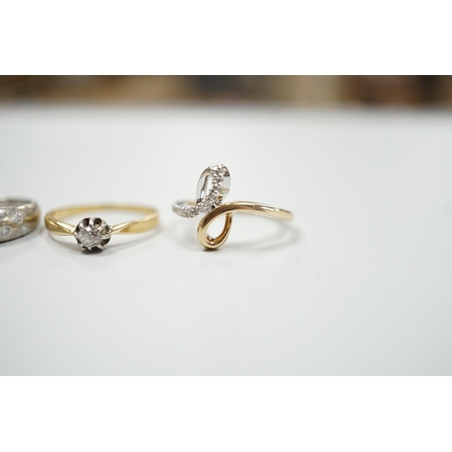 1879 - Three modern 9ct gold and diamond chip set rings and a yellow metal and solitaire diamond set ring, ... 