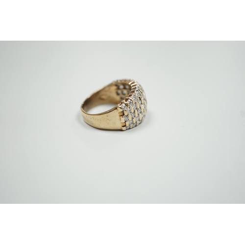 1883 - A modern yellow metal and pave set five row diamond dress ring, size R, gross weight 9.2 grams.... 