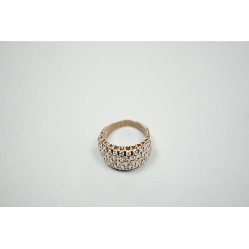 1883 - A modern yellow metal and pave set five row diamond dress ring, size R, gross weight 9.2 grams.... 