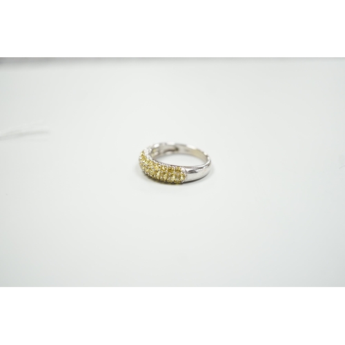 1887 - A modern 18ct white gold and yellow stone cluster set half hoop ring, size K, gross weight 4.2 grams... 